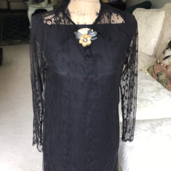 Black lace over black strapless sheath dress. - Picture 1 of 4